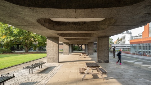 Under the raised faculty building