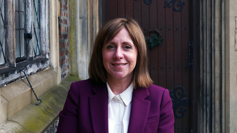 Woman in purple jacket