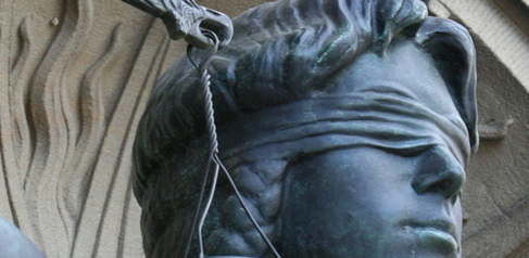 blind folded statue