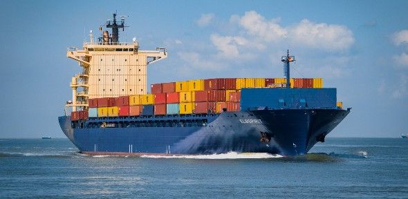 Blue container ship laden with brightly-coloured boxes. Image by dendoktoor from Pixabay Blue container ship laden with brightly-coloured boxes. Image by dendoktoor from Pixabay