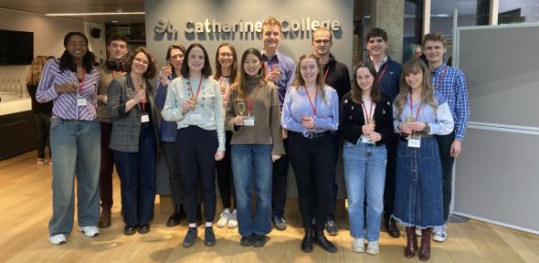 Cambridge Undergraduate Conference in German Studies The organisers of the CUGS smiling and toasting at St Catharine's College.