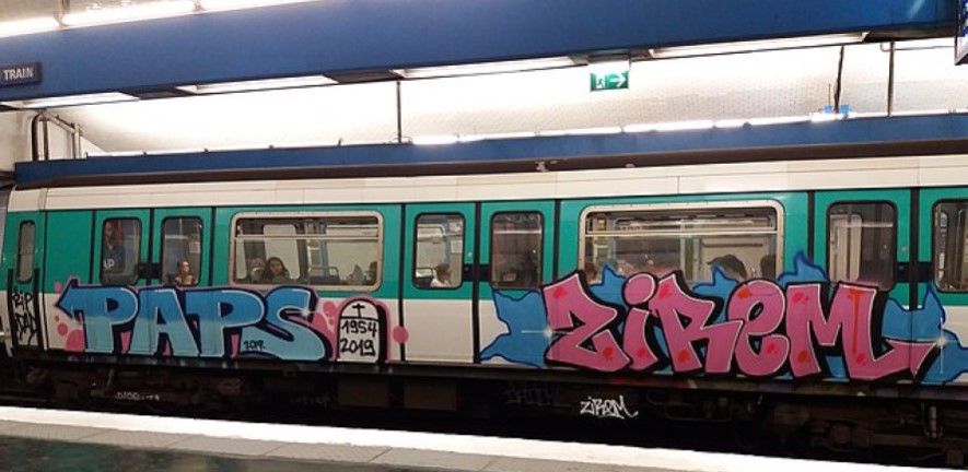 Image of train covered in graffiti 