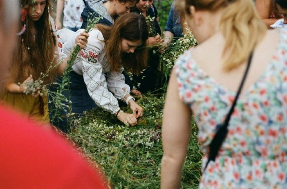 'Wreath makers on St John's Eve' by Robert Salvia. A group of Ukrainian women make wreaths from flowers and vegetation